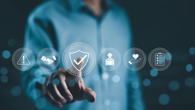 Person interacting with virtual safety and compliance icons on a digital interface