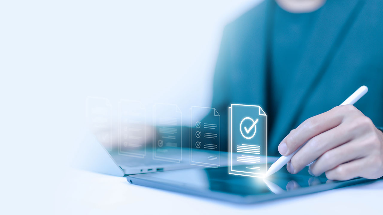 Person using a digital tablet with floating icons