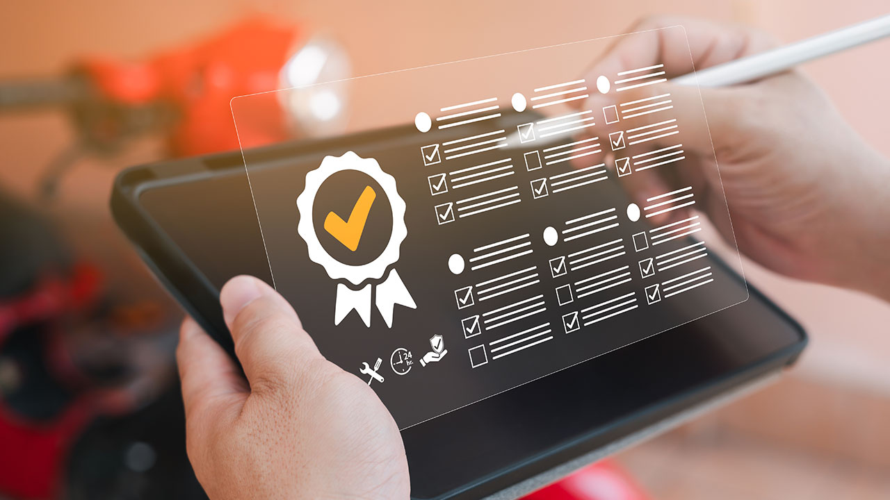 Person using a tablet with a digital checklist and certification icons overlayed