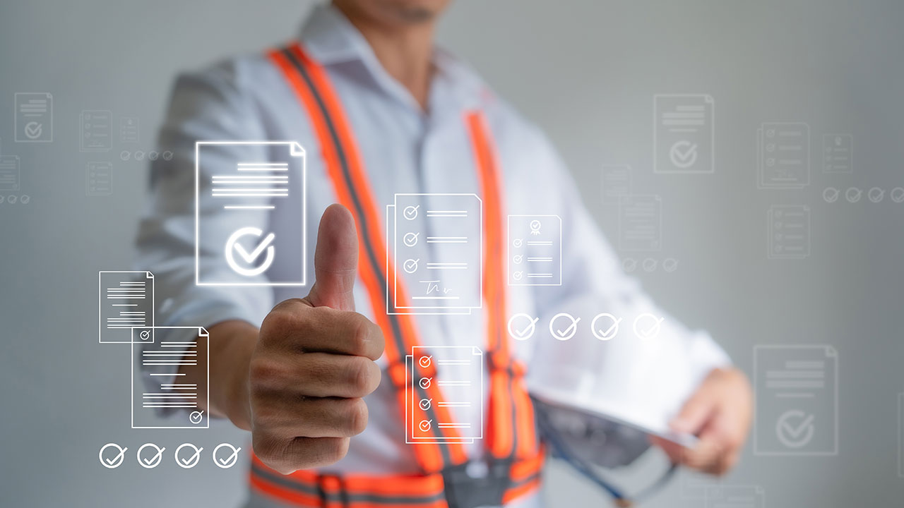 Worker giving thumbs up with digital checklist icons overlayed