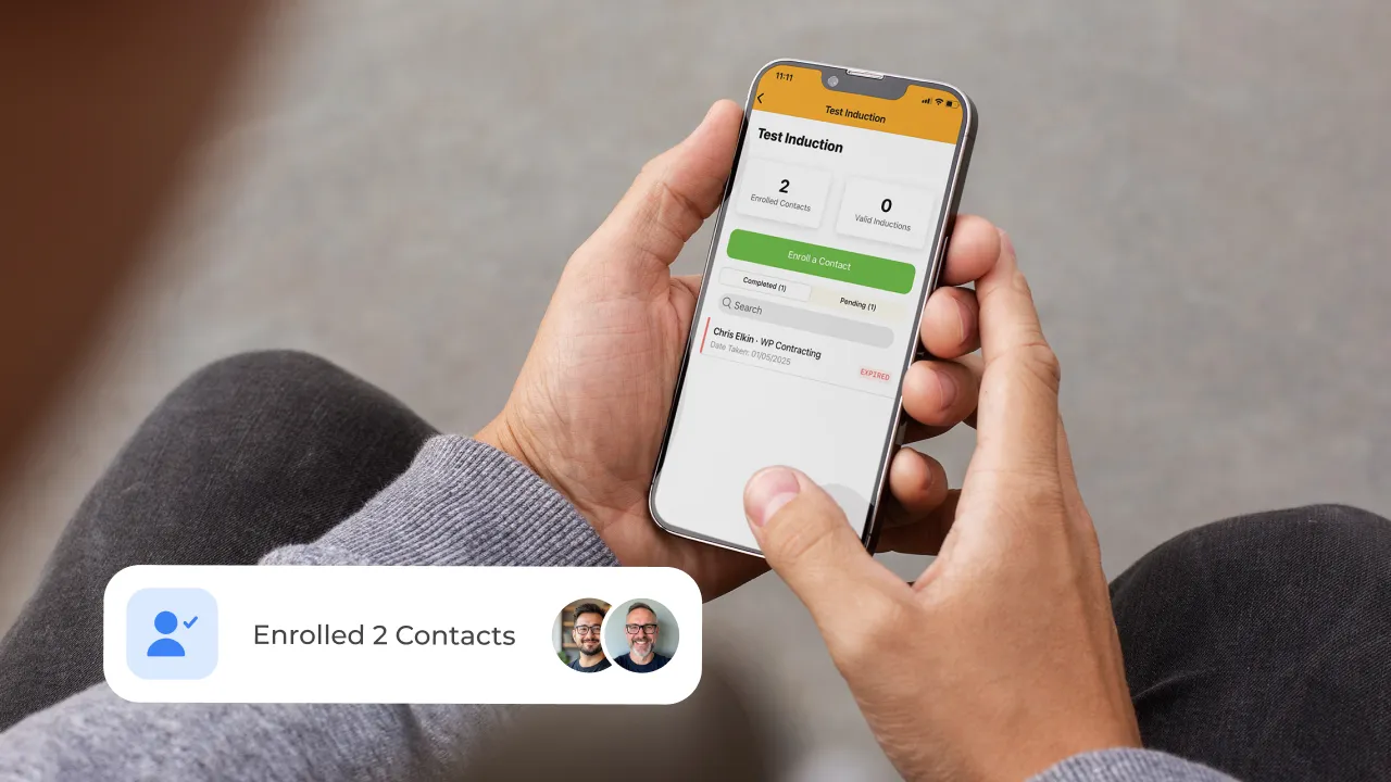 Person holding phone showing Work Wallet induction screen