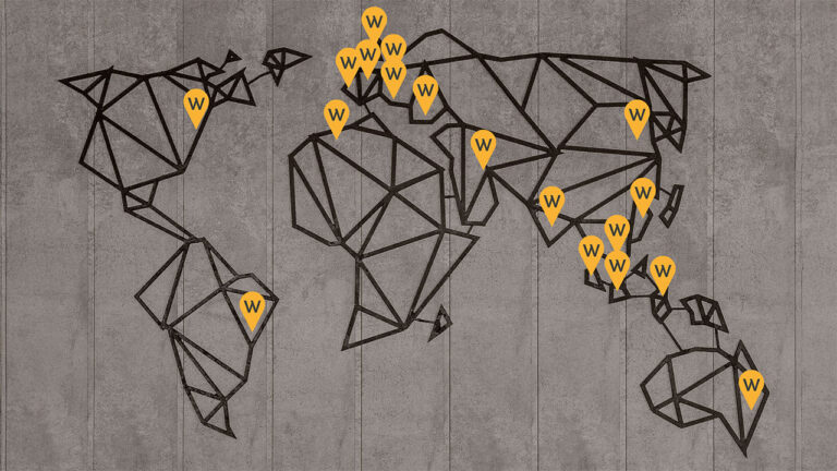 Geometric world map showing location pins for Work Wallet